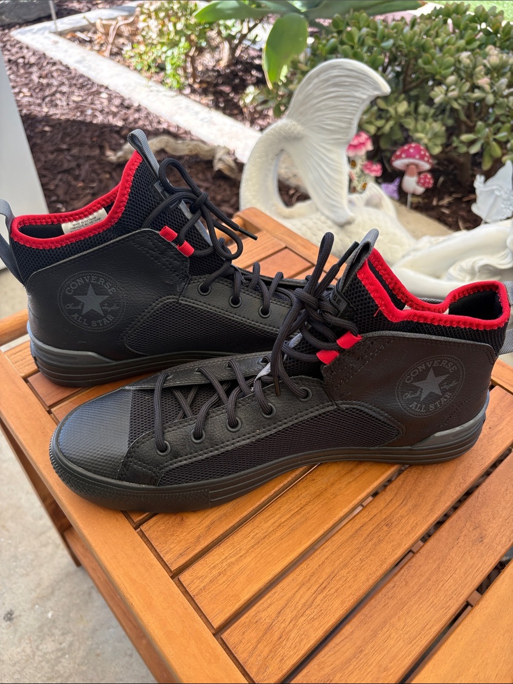Converse Men’s Black High-Top Sneakers with Red Lining